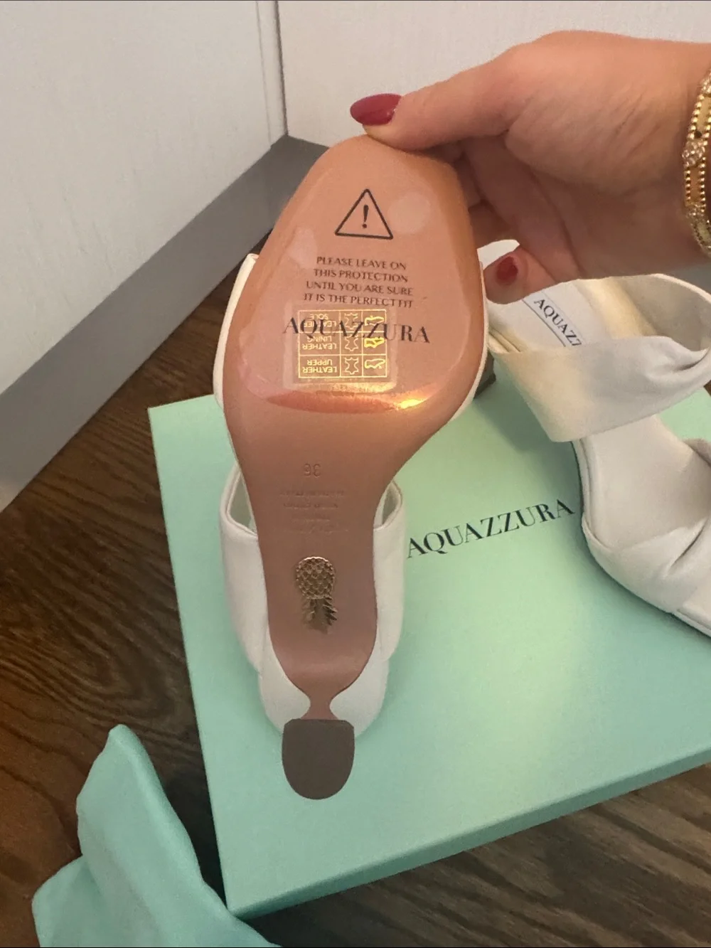 Aquazzura Cream Knotted Slide Heels